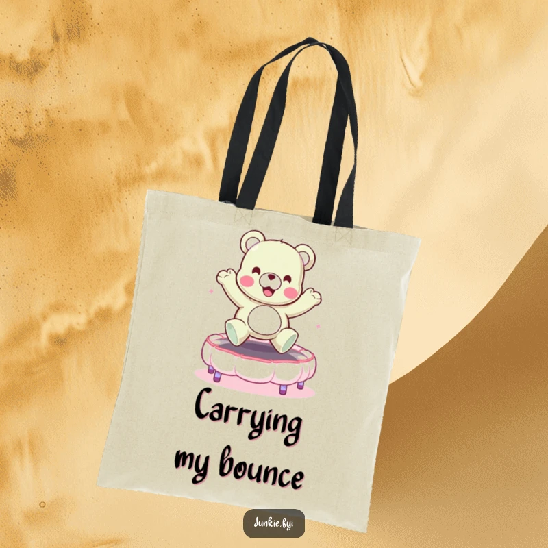 Funny tote bag with a cheerful gummy bear character bouncing high on a marshmallow trampoline. Playful and practical.